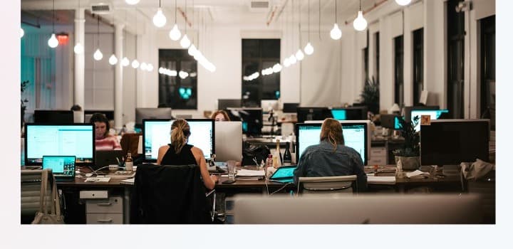 SocialCents team working in an office